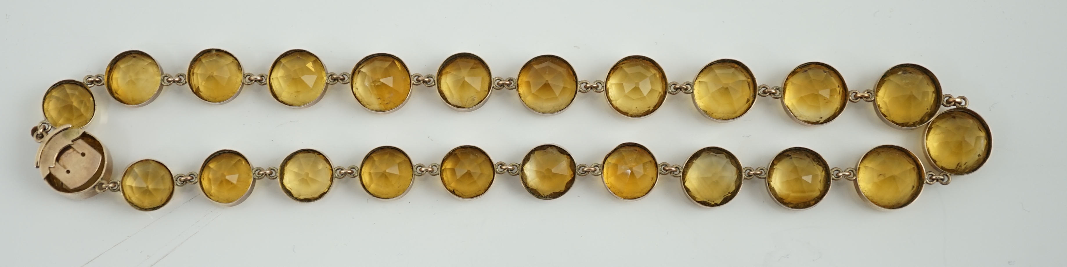 An early 19th century gold and citrine riviere necklace